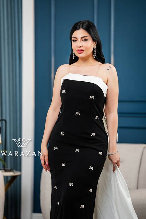 فستان سهرة ناعم ماسك بذيل من الخلف 