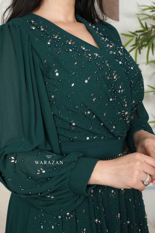 فستان سهرة ساتر بتطريز راقي