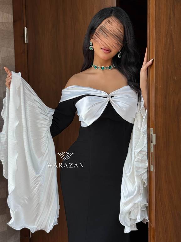 فستان سهرة راقي بأكمام بيليسيه واسعة 