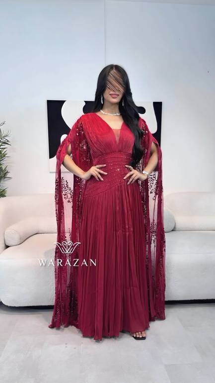 فستان سهرة ملكي بذيل ترتر
