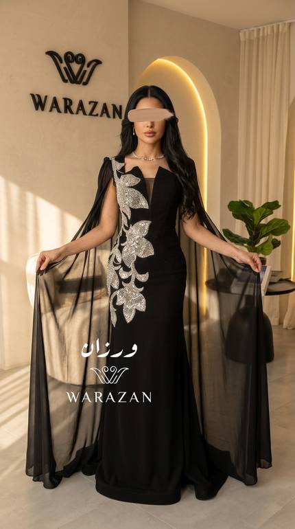 فستان سهرة أسود بكيب شيفون وتطريز خرز فضي