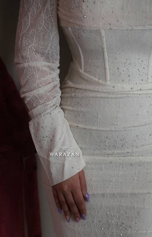 فستان سهرة باكمام طويلة و بلمعة