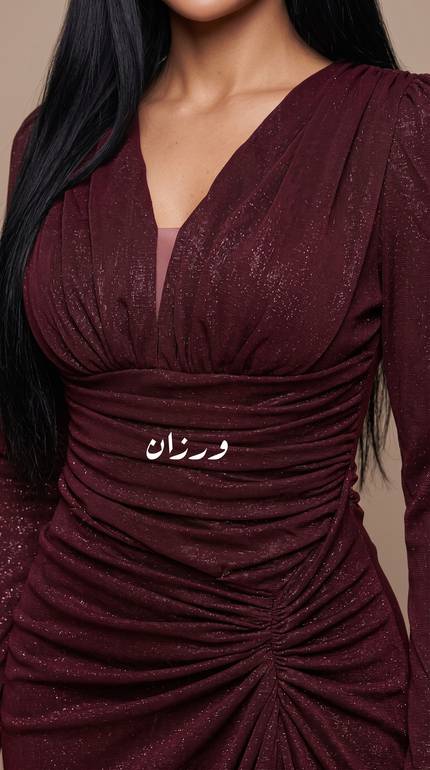  فستان سهرة بكسرات بتصميم درابيه فاخر