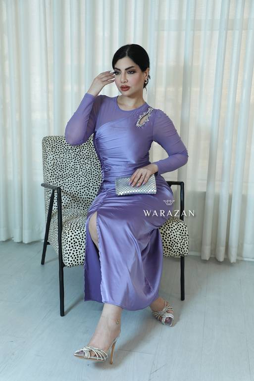 فستان سهرة بتصميم شفاف من الكم 