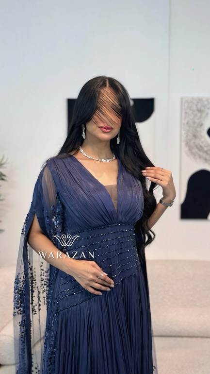 فستان سهرة ملكي بذيل ترتر