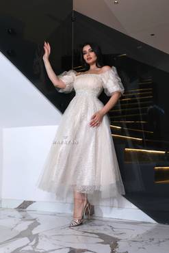 فستان سهرة ميد بأكمام بف 