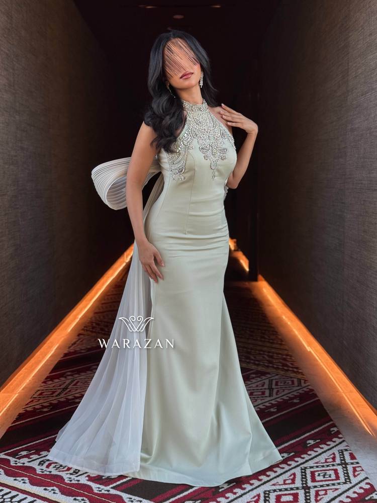 فساتين سهرة راقية مطرزة مع ذيل بيليسيه 