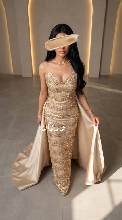 فستان سهرة ذهبي  مع كاب أنيق للمناسبات