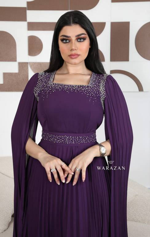 فستان سهرة ناعم بليسيه تطريز