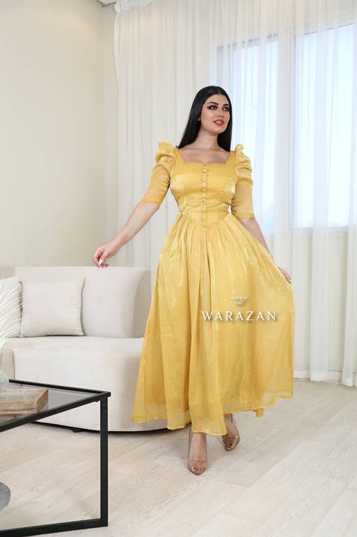فستان أنيق بألوان الهبة