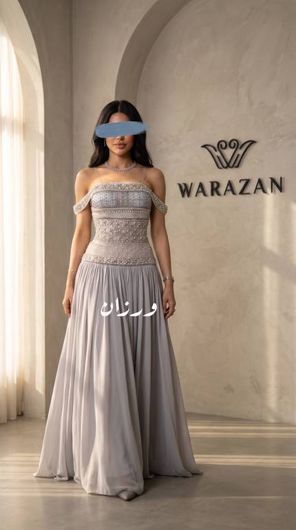 فستان سهرة بتصميم أنثوي وتطريز فاخر