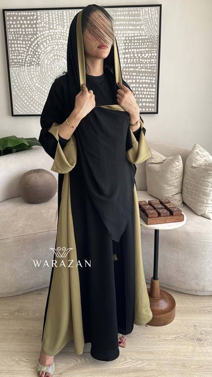 عباية سوداء أنيقة بتدخيلة لون 