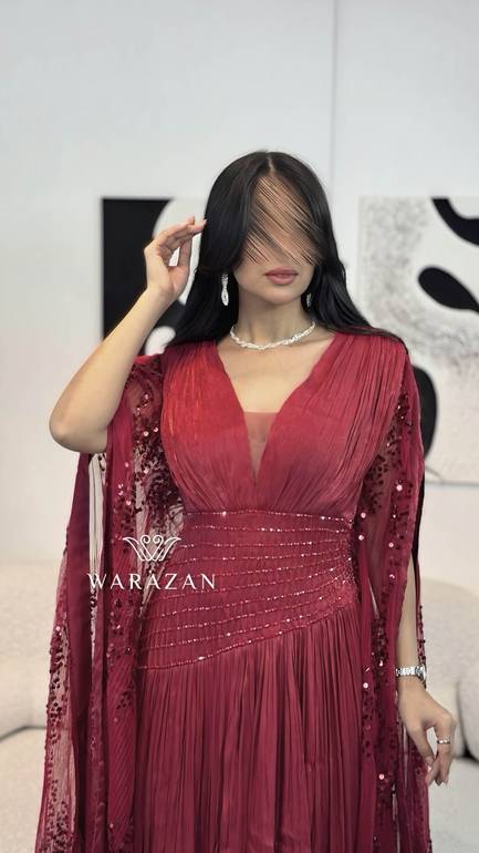 فستان سهرة ملكي بذيل ترتر