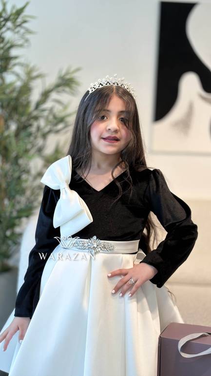فستان بفيونكة من الكتف