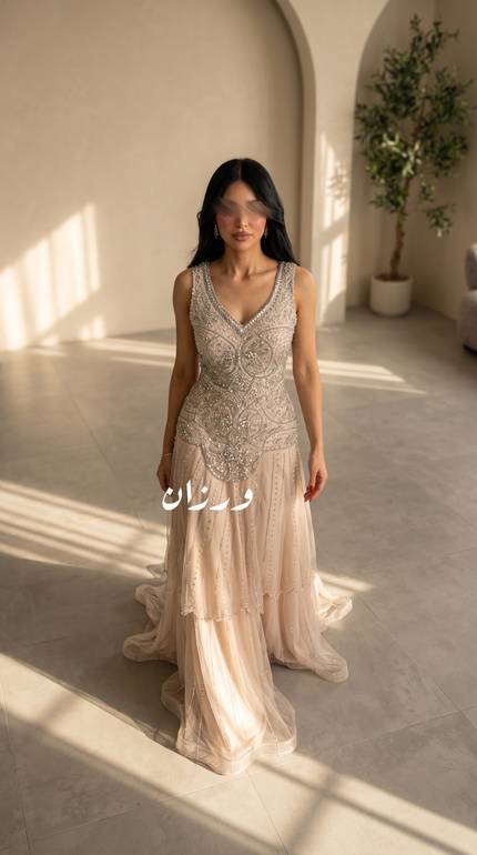 فستان سهرة بيج  مع تنورة تول ناعمة