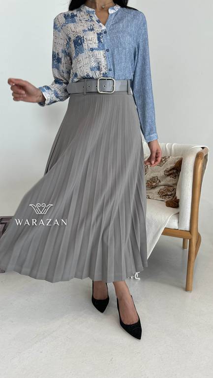 تنورة بكسرات ميدي بقصة واسعة