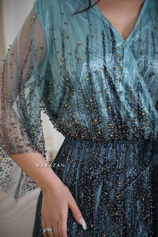 فستان سهرة بتطريز للمناسبات الراقية