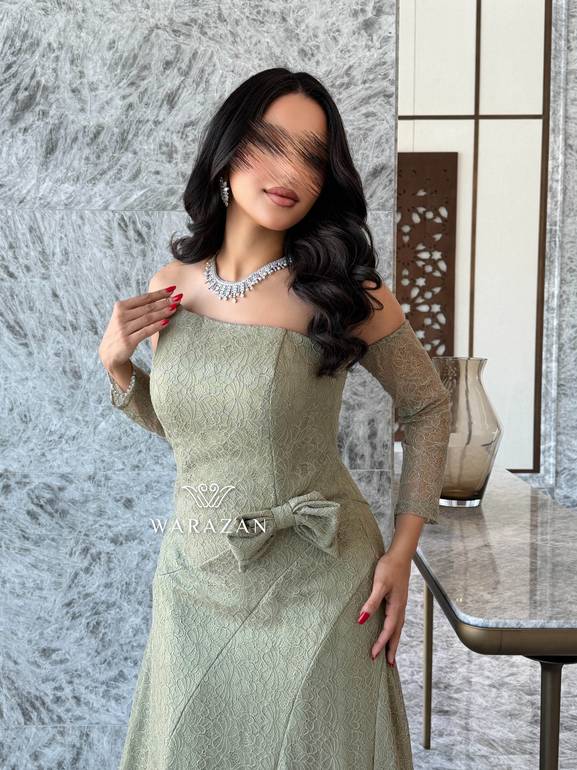 فستان سهره بدتخيلة اكمام دانتيل و فيونكه من الخصر