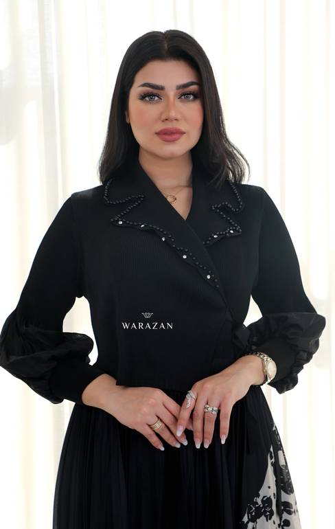 فستان مشجر بكسرات و ورده من الخصر 