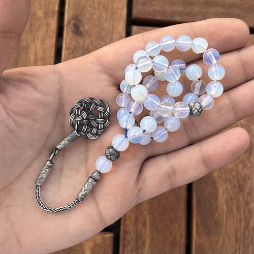حجر (خامة طبيعية) عدد الخرز 39 مقاس 8ملي بكركوشة وفواصل فضة موديل طربزوني 