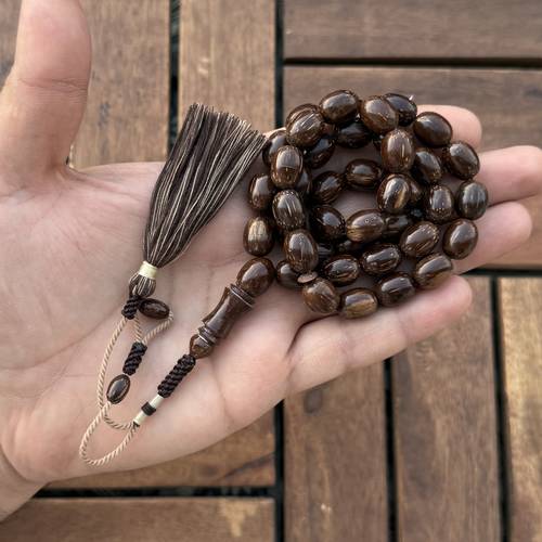 كوك سركالي (خامة طبيعي) عدد الخرز 41 مقاس الخرز 10*12.5ملي بكركوشة قماش من تفصيلنا وتصميمنا 