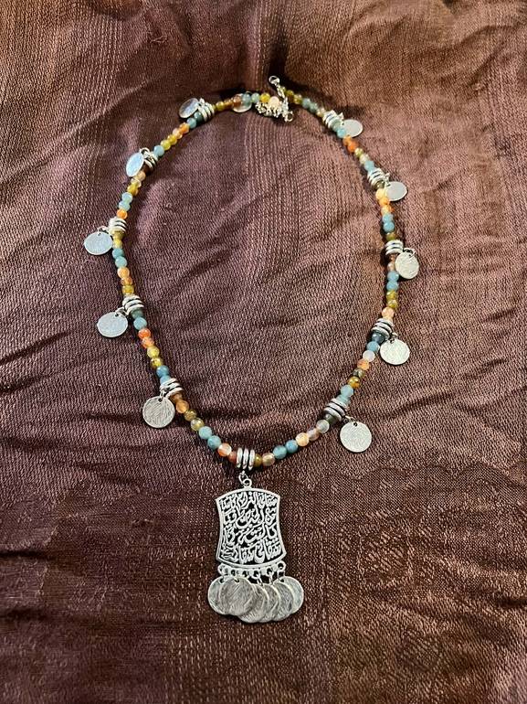 Multi color beads necklace with silver color pendants