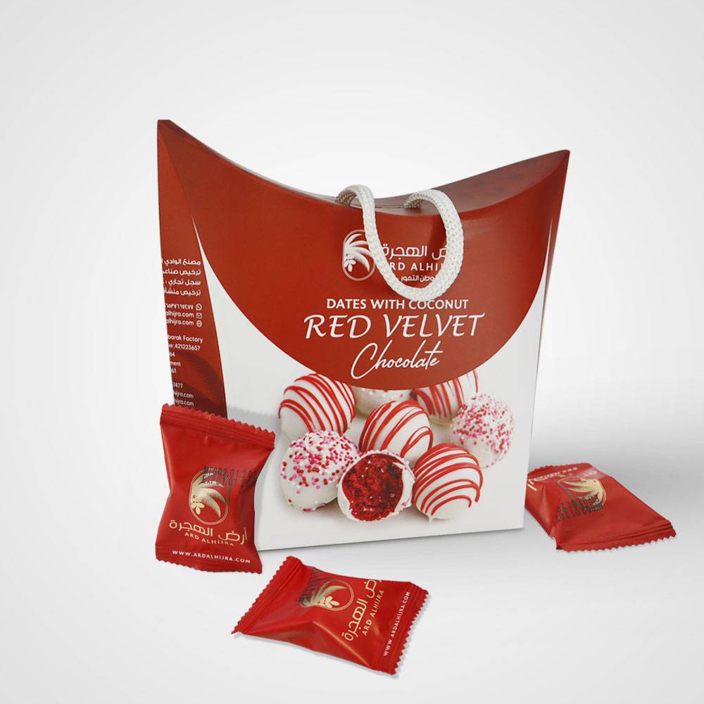 Dates stuffed with red velvet and coconut