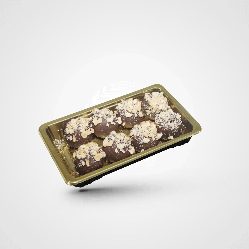 Mini date balls covered with crunch and hazelnuts