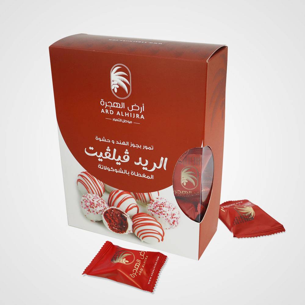 Dates stuffed with red velvet and coconut 