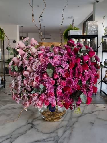 Glass Vase with pink shades flowers 