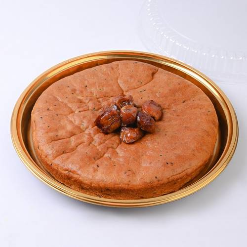 A plate of mala bread with black forest honey