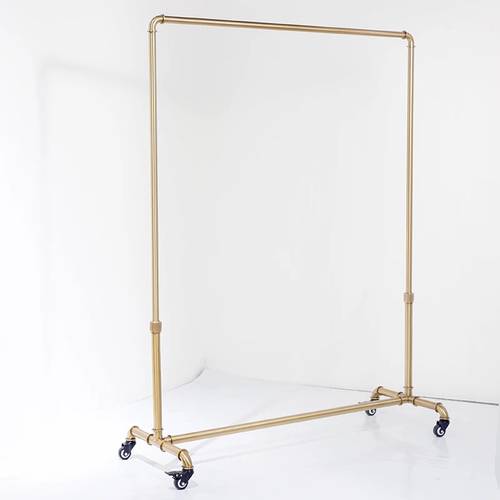 Golden armored stand for hanging clothes and abayas