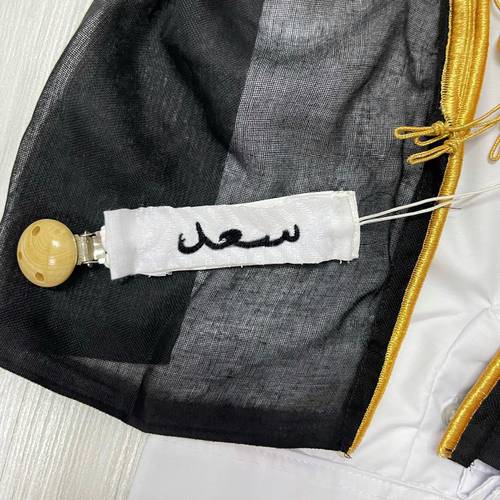 تعليقة لهاية الشماغ الابيض بالاسم