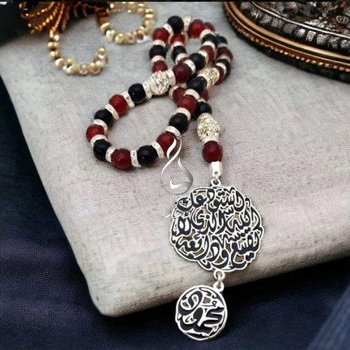 سبحه عقيق احمر واسود بدلايتين