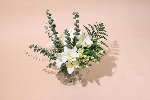 Casablanca lilies and alstroemeria in a vase 