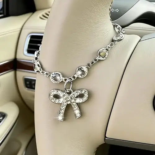 قطعة واحدة فاخرة لتزيين عجلة القيادة للسيارة بسلسلة فيونكة مرصعة بالأحجار الكريمة، ديكور داخلي أنيق وفريد للسيارة للسيدات