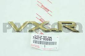 علامة شبك VXR لاندكروزر 1998-2002 ذهبي