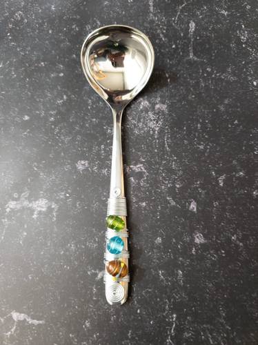 Sauce ladle with colored stones