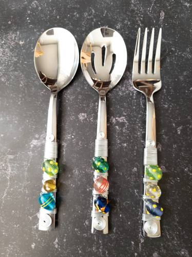 Set of two serving spoons with a fork