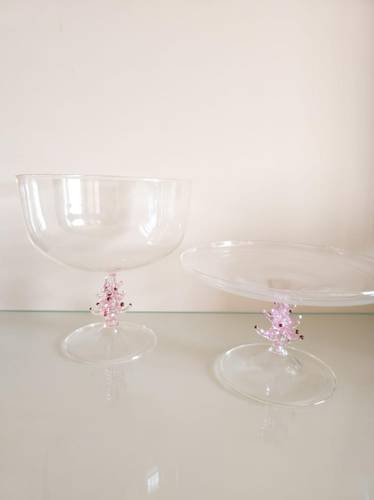 Transparent light pink cups and flats