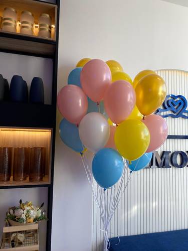26 pink, blue, yellow, gold and white helium balloons
