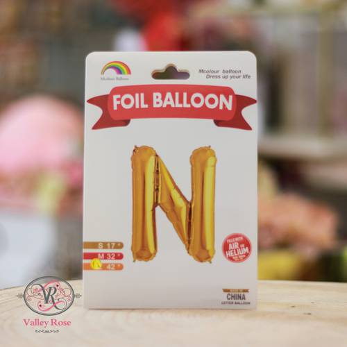 Gold helium foil balloons letters N