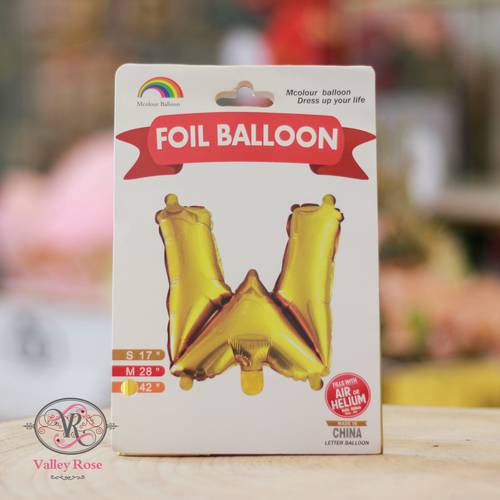 Gold helium foil balloons letters W