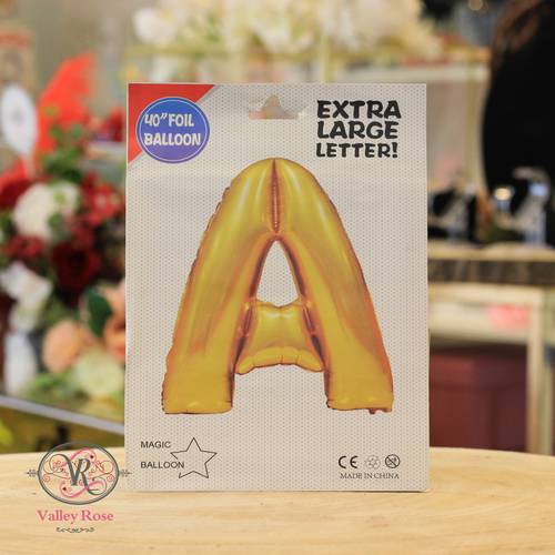Gold helium foil balloons letters A