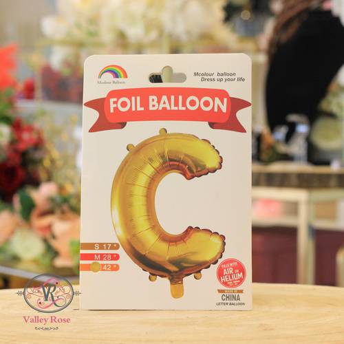 Gold helium foil balloons letters C