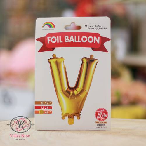 Gold helium foil balloons letters V
