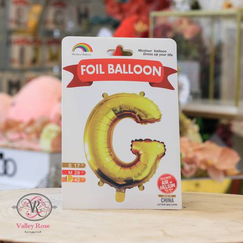 Gold helium foil balloons letters G