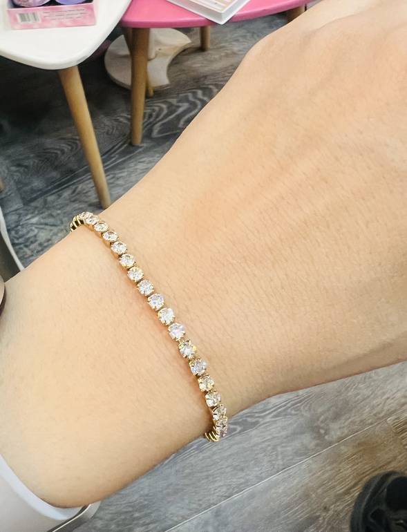Medium size gold tennis bracelet 