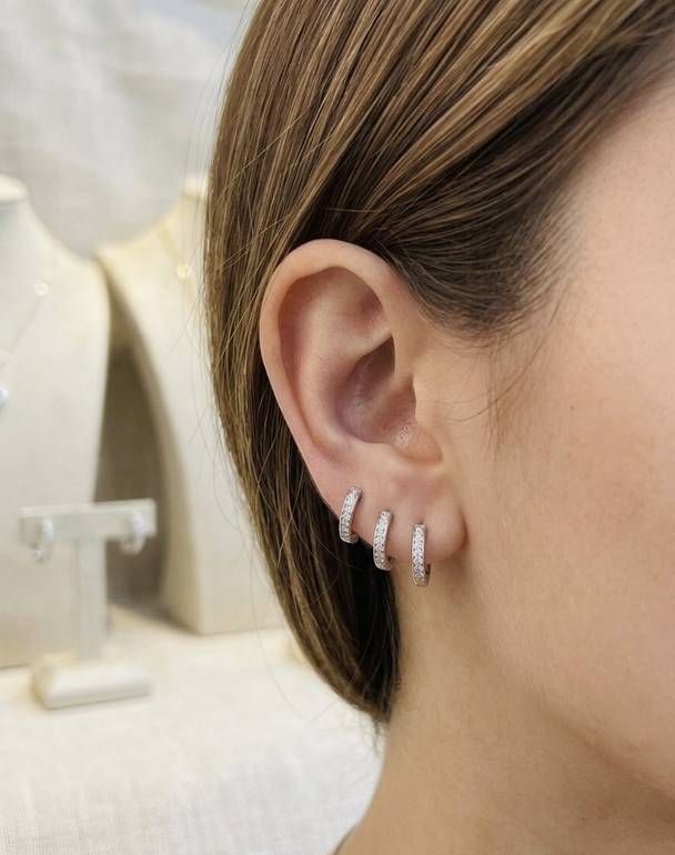3 sizes of silver earrings 