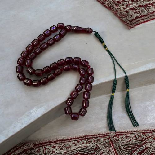 سبحة بكلايت عنابي شفاف